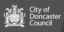 Black rectangle with a coat of arms.  White text that says City of Doncaster Council