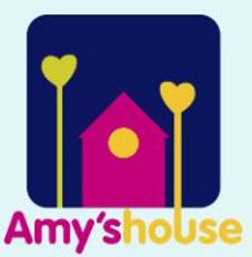 Purple square with a pink house and 2 yellow flowers with love hearts for petals.  Text says Amy's House
