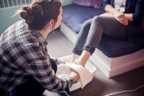 person caring for someone's feet